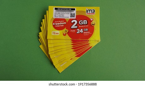 Yogyakarta, Indonesia Feb 15th 2021, Pile Or Stack Of Prepaid Im3 Sim Card Internet Package Preloaded With 2GB Data Credit From Indosat Ooredoo Company, Cellular Provider Operator From Qatar Telecom 