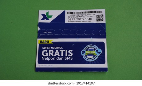 Yogyakarta, Indonesia Feb 15th 2021 Prepaid XL  Regular Package Sim Card From XL Axiata Indonesia Company Member Of Big Asian Cellular Provider Group Isolated On Green Background