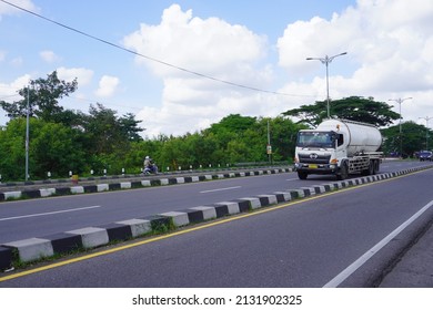 Yogyakarta, Indonesia - January 4, 2022: A Tanker Truck Crosses The Road On The Outskirts Of The City.