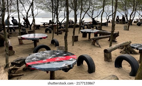 Yogyakarta, Indonesia - July 11, 2022: Outdoor Cafe Seating In Pacitan Beach Area