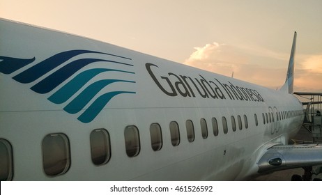 YOGYAKARTA, INDONESIA - JULY 30, 2016: A Garuda Indonesia Airplane At Sunrise. Garuda Indonesia Is The National Airline Of Indonesia.