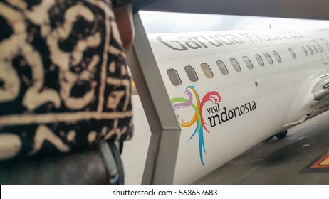 YOGYAKARTA, INDONESIA - JULY 30, 2016: A Garuda Indonesia Airplane At Sunrise. Garuda Indonesia Is The National Airline Of Indonesia.