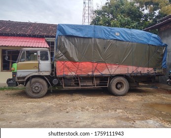 Yogyakarta, Indonesia, June 1, 2020; 
An Old Truck Parked In A Food And Drink Distribution Warehouse