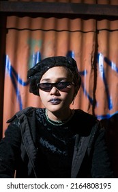 Yogyakarta Indonesia, June 16, 2019. Gangsta Women Wearing Black Jacket, Black Glasses, Chain Necklace, With Black Lips 