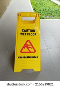 Yogyakarta, Indonesia. June 2, 2022. Yellow Signage Watch Out For Wet And Slippery Floors In An Office. Be Careful On Foot. Yellow Sign For Wet Floor. 