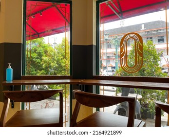 Yogyakarta, Indonesia - Mar 2022 : Outside View Of A Cafe From Glass Windows From Inside