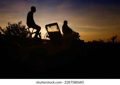 Yogyakarta Indonesia - May 22 2017. A young couple enjoying sunrise while driving jeep in Mount Merapi Yogyakarta Indonesia  - Powered by Shutterstock