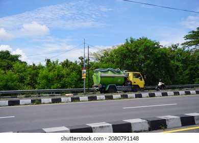 Yogyakarta, Indonesia - November 25, 2021: A Tanker Truck Crosses The Road On The Outskirts Of The City.