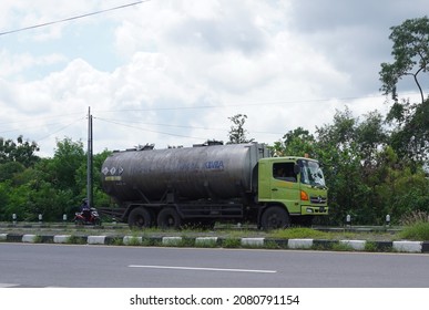 Yogyakarta, Indonesia - November 25, 2021: A Tanker Truck Crosses The Road On The Outskirts Of The City.