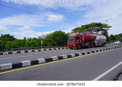 Yogyakarta, Indonesia - November 5, 2021: A Tanker Truck Crosses The Road On The Outskirts Of The City.