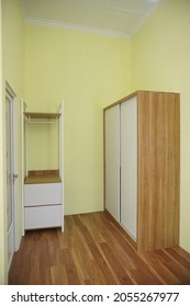 Yogyakarta, Indonesia - October 10 2021: Wooden cupboard and wardrobe on a room taken from several different angle.