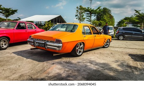 Yogyakarta Indonesia October 17 2021 An Orange Holden Kingswood On A Parking Lot Tried To Park