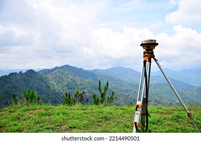 Yogyakarta, Indonesia - October 3 2022 : GNSS-geodetic Receiver Mounted On A Tripod. Practical Application In The Field For Working In Networks Of Permanently Operating Base Stations