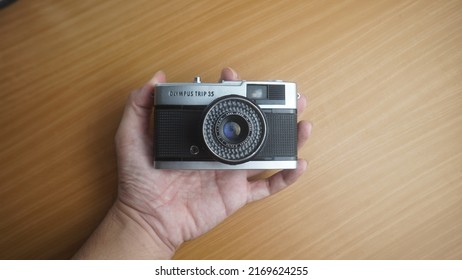 YOGYAKARTA, INDONESIA - OCTOBER 7th 2014 - an olympus trip 35 analog camera. Manufactured by Olympus. This camera was introduced in 1967 and discontinued, after a lengthy production process, in 1984.
