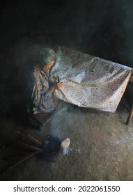 Yogyakarta, Java, Indonesia - July, 2020: Old Lady Painting Batik With Hand. Batik Is One Of Indonesian Heritages Which Has Become An Icon Of UMKM And National Dress In Indonesia. Javanese Batik.