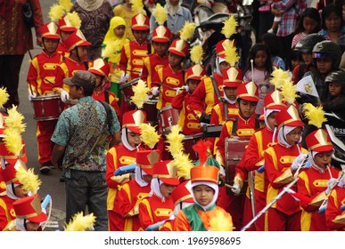 Yogyakarta,Indonesia-January 24 2013:A Group Of Elementary School Kids Playing A Marching Band