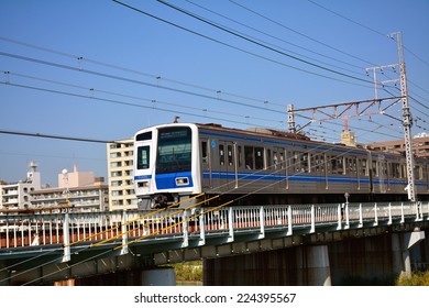 YOKOHAMA, JAPAN - October, 2014 : The Seibu Shinjuku Line Passing On Ootsuna Bridge At Yokohama:The Seibu Shinjuku Line Is A Japanese Railway Line Owned By The Private Railway Operator Seibu Railway.