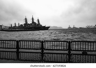 YOKOSUKA, JAPAN - APRIL 11, 2017 - Arleigh Burke-class Destroyers Anchored In Stormy Waters At The United States Fleet Activities Yokosuka Navy Base