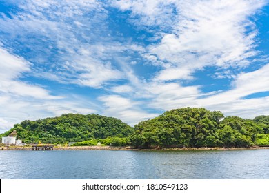 Yokosuka, Japan - July 19 2020: Azuma Island In The Yokosuka Naval Port Belonging To The US Navy Azuma Storage Area And Separating The Japan Self Denfence Fleet From The United States Seventh Fleet.