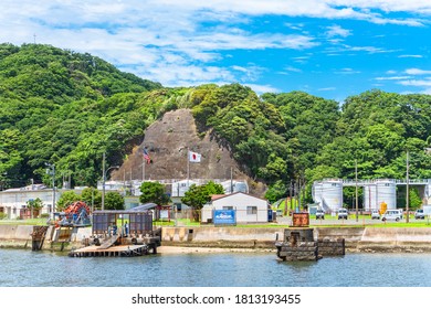 Yokosuka, Japan - July 19 2020: Pontoon Of The Arai Canal Waterway Fuel Terminal Along The Azuma Storage Area Of Azuma Island Belonging To The United States Seventh Fleet In The Yokosuka Naval Port