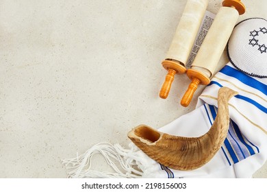 Yom kippur concept. Tallit, Thorah and Shofar jewish religious symbols
