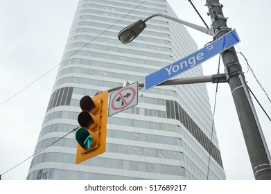 Yonge Street Sign And Traffic Light Toronto Downtown. Green Light.