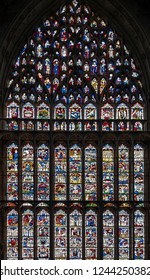 York, England - April 2018: The Great East Window, medieval stained glass installed at the East End of the cathedral of York Minster in the City of York, UK