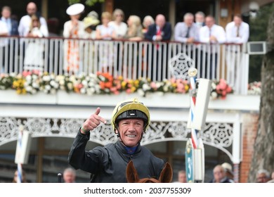 YORK RACECOURSE, YORK, UK : 20 August 2021 : Top jockey Frankie Dettori points to the crowd and celebrates as he enters the Winners Enclosure on Stradivarius after winning the Group 2 Lonsdale Cup