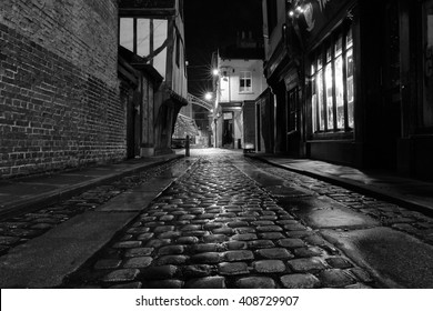 YORK, UK - April 12: Cobbled Street At Night On April 12, 2016 In York.