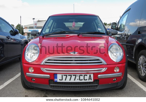 YORK, UK - CIRCA AUGUST 2015: red Mini\
Cooper car (new model, produced from 2013\
onwards)
