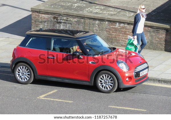 YORK, UK - CIRCA\
AUGUST 2015: red Mini Cooper car (new model, produced from 2013\
onwards) with black roof