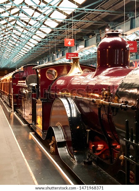 York / UK - July 28 2019: Red royal\
steam train in National Railway Museum, York,\
UK