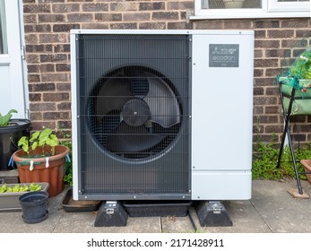 York, UK - June 25 2022: Mitsubishi Ecodan Air Source Heat Pump Installed Beside A Brick House Wall