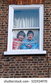 YORK, UK - JUNE 29, 2016: A printed picture of the Beatles on a window - Shutterstock ID 531924970