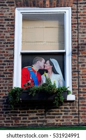 YORK, UK - JUNE 29, 2016: A Printed Picture Of Catherine, Duchess Of Cambridge And Prince William, Duke Of Cambridge On A Window