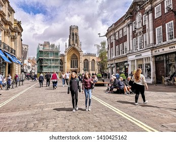 YORK, UK - MAY 25, 2019:  View Of Shoppers And Tourists In St Helens Square In The Centre Of York  