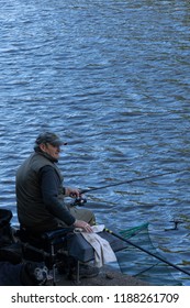 York,North Yorkshire,United Kingdom.9.12.2018.Angler Fishing On The Bank Of The River Ouse, North Yorkshire, England, UK.