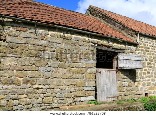 Yorkshire Stable Barn Door Within Stonewall Stock Image