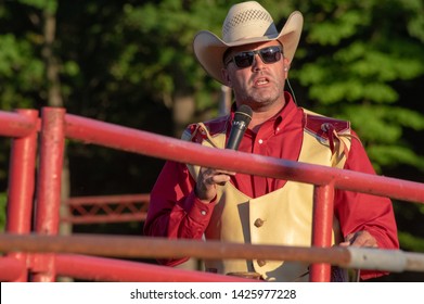 Yorkville, IL / USA - July 2018: Big Hat Rodeo Kendall County Fair Association Fox Valley Rodeo Announcer MC Cowboy World Championship