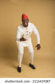 Yoruba Culturally Dressed Business Man Dancing And Smiling