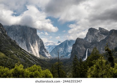 Yosemite national park, California, beautiful Tunnel View with waterfall. El Capitan with cloud on top - Powered by Shutterstock