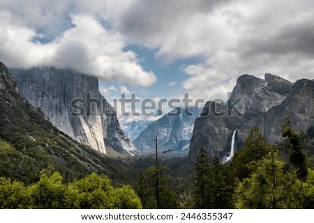 Yosemite national park, California, beautiful Tunnel View with waterfall. El Capitan with cloud on top