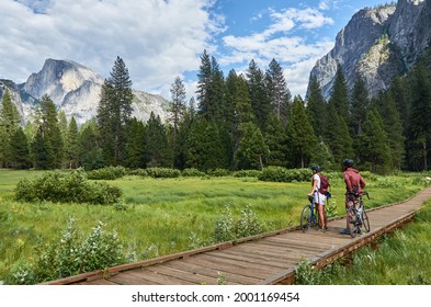 YOSEMITE NATIONAL PARK, CALIFORNIA, USA – JUNE 26, 2021: Mountain Biking In Yosemite National Park. Sustainable Tourism.