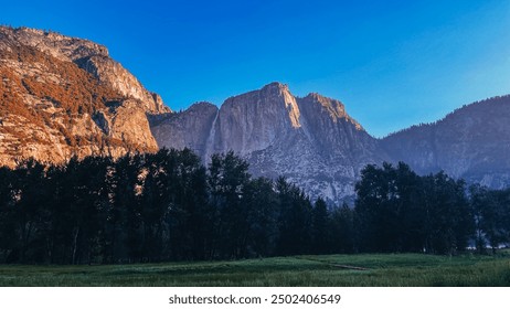 Yosemite National Park sunrise from the valley looking at Yosemite Falls in California - Powered by Shutterstock