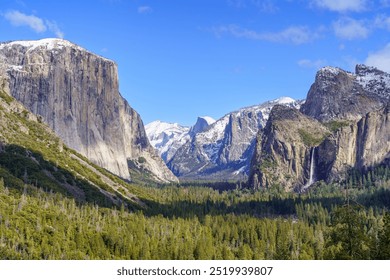 Yosemite Valley’s Tunnel View: Snow-Capped Peaks and Bridalveil Fall Radiating Early Spring Beauty - Powered by Shutterstock