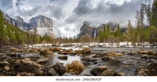 Yosemite Valley from the Merced River turnout with dramatic stormy weather during winter with snow. Dramatic light on the river.  Yosemite National Park, California. - Powered by Shutterstock