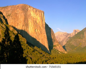 Yosemite's El Capitan glowing golden in setting sunlight - Powered by Shutterstock