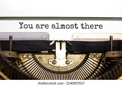 You are almost there symbol. Concept words You are almost there typed on retro typewriter. Beautiful white background. Business and you are almost there concept. Copy space. - Shutterstock ID 2140507017