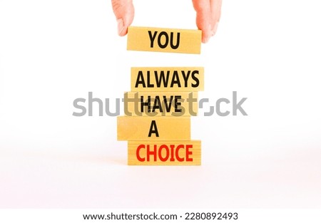 You always have choice symbol. Concept words You always have a choice on wooden block. Beautiful white table white background. Businessman hand. Business you always have choice concept. Copy space.