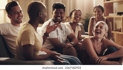 You always make me laugh until my stomach hurts. Shot of a group of a diverse group of friends relaxing in the lounge at home. - Powered by Shutterstock